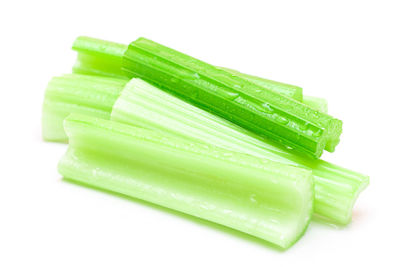 Close-up of green pepper against white background