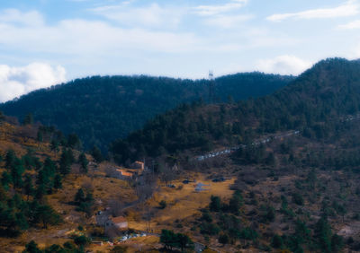 High angle view of trees on mountain against sky