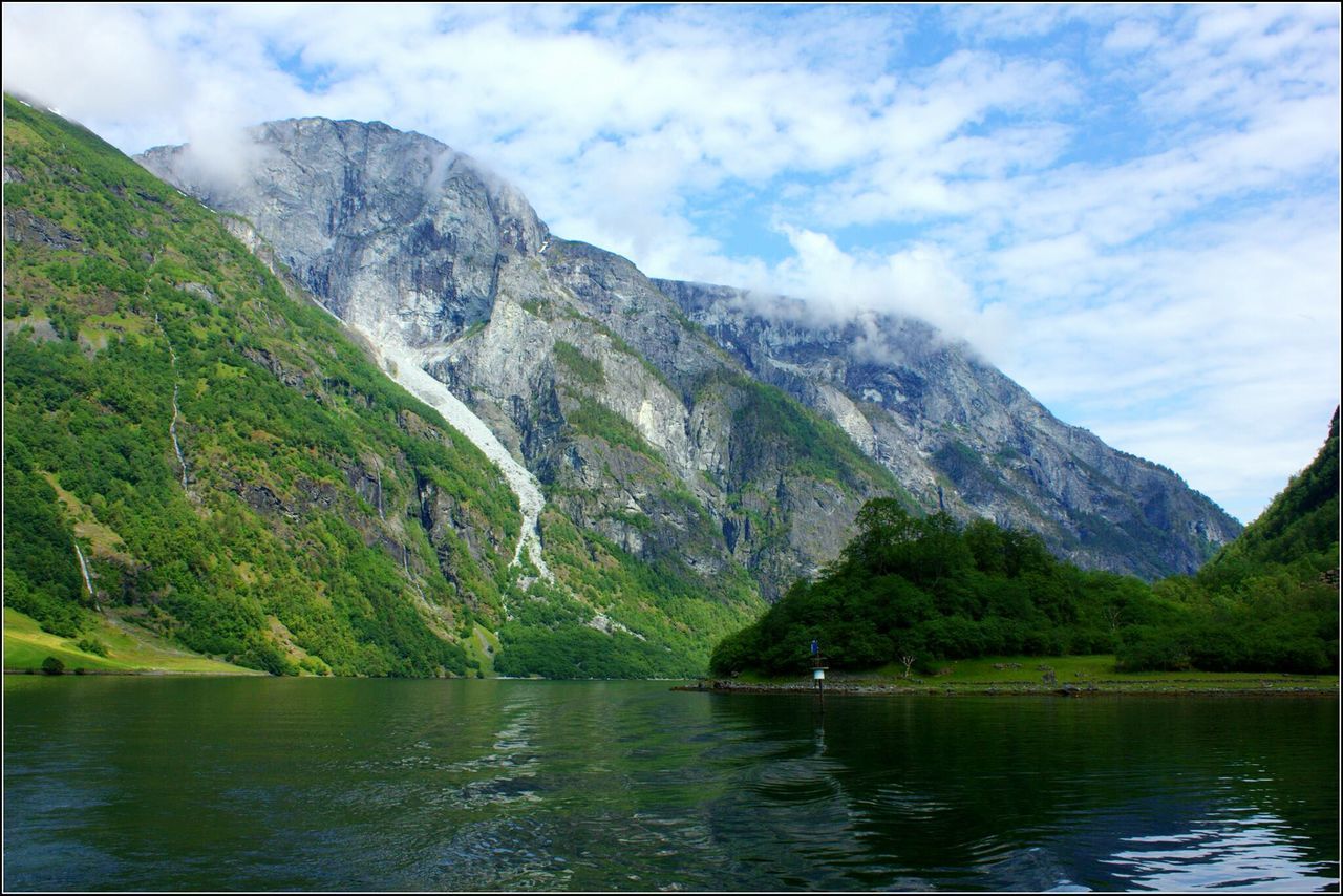 SCENIC VIEW OF LAKE AGAINST MOUNTAIN