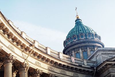 Low angle view of buildings against sky in city