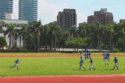 People running on grassland