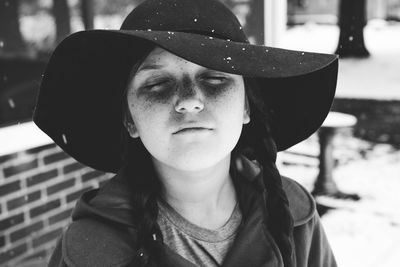 Close-up of girl wearing hat