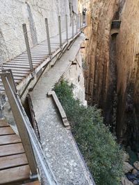 High angle view of steps amidst buildings