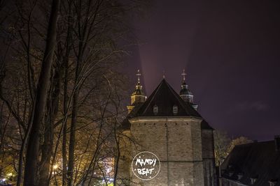 Low angle view of church against sky at night
