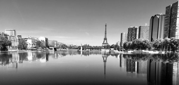 Panoramic view of river and buildings against sky