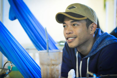Portrait of young man looking away