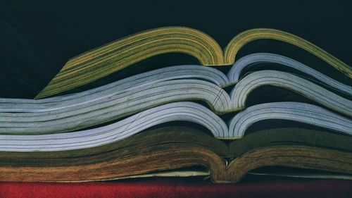 Opened books in aligned stacks