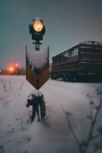Light painting on snow covered street at night