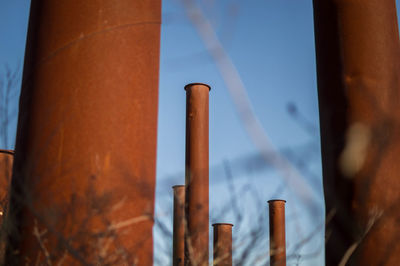 Low angle view of metal structure against sky