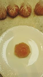 High angle view of fruits in plate on table