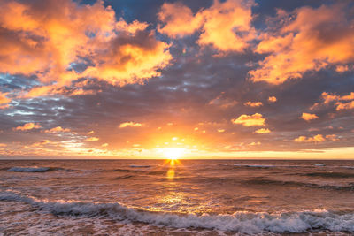 Scenic view of sea against sky during sunset