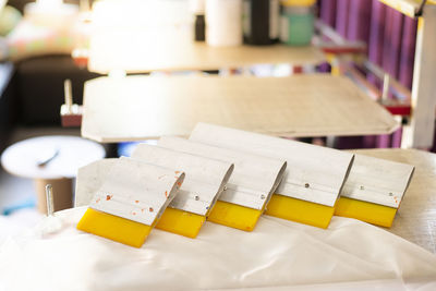 Close-up of open book on table at home