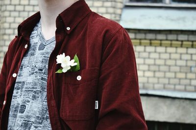 Close-up of woman standing on tiled floor