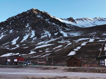Scenic view of snow covered mountain against sky
