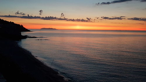 Scenic view of sea against sky during sunset