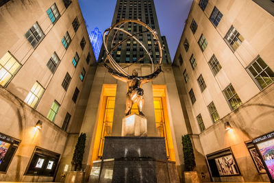 Low angle view of statue against sky