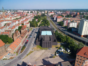 High angle view of street amidst buildings in city