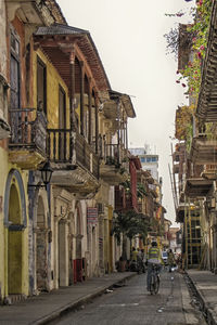 View of city street against clear sky