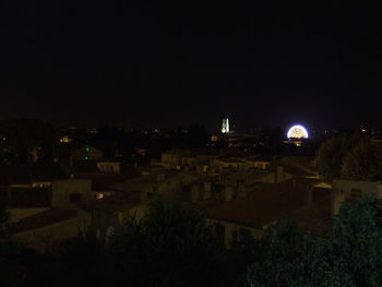 View of illuminated buildings at night