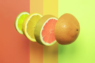 Close-up of oranges against orange background