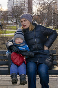 Portrait of father and son in winter