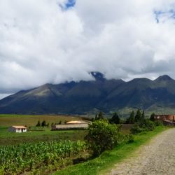 Scenic view of landscape against cloudy sky