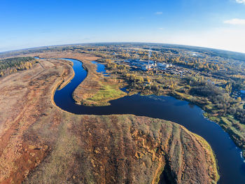 Aerial view of river passing through landscape