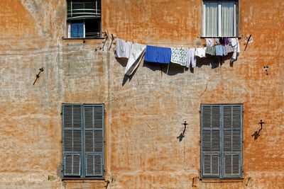 Clothes drying against building