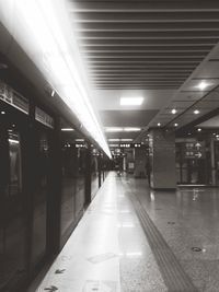 Illuminated railroad station at night