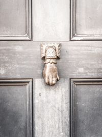 Close-up of sculpture on door