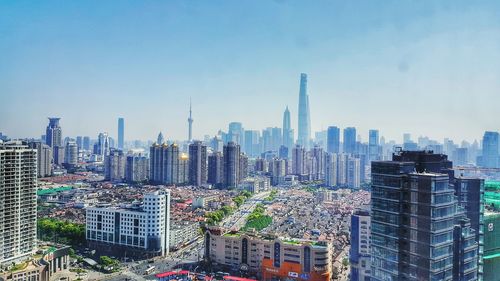 Cityscape against blue sky