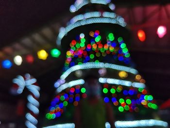 Close-up of illuminated christmas tree at night