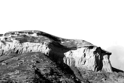 Scenic view of rock formation against clear sky