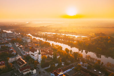 High angle view of townscape against sky during sunset