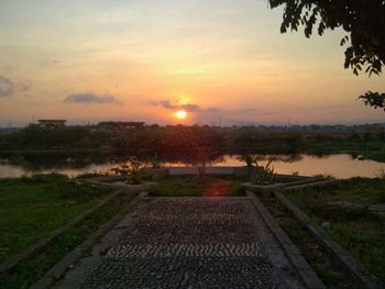 Scenic view of landscape at sunset