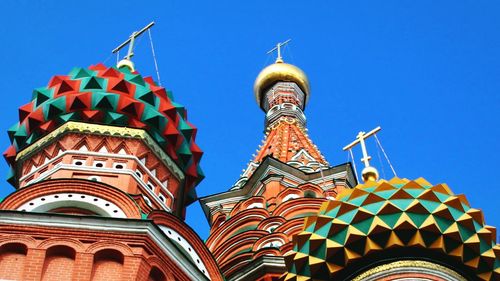 Low angle view of temple against blue sky