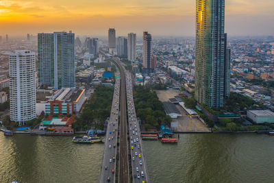 High angle view of river amidst buildings in city