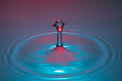 Close-up of drop splashing in water