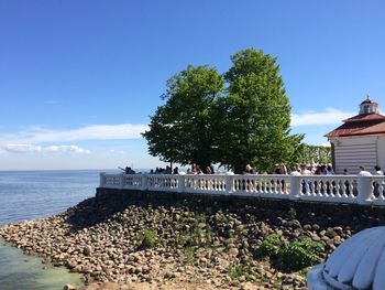 Scenic view of sea against blue sky