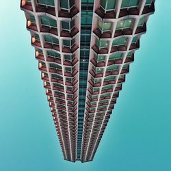 Low angle view of building against clear blue sky