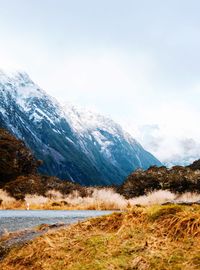 Scenic view of snowcapped mountains against sky