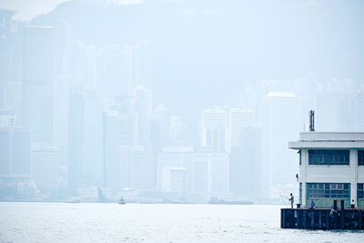 Modern buildings in city against sky