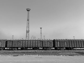 Railroad tracks against sky during winter