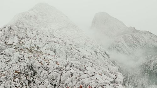 Scenice view of jade dragon snow mountain in fog