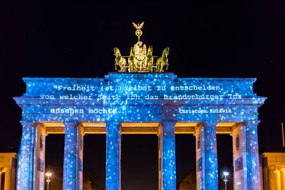 Low angle view of statue at night