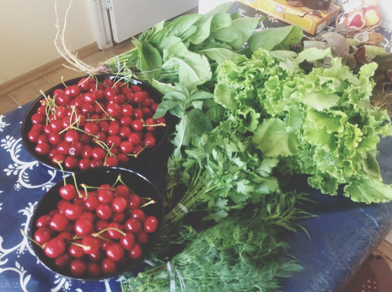 food and drink, food, healthy eating, freshness, fruit, red, vegetable, indoors, high angle view, tomato, organic, green color, ripe, strawberry, still life, leaf, abundance, close-up, raw food, no people