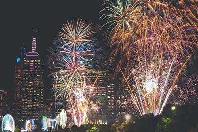 Firework display at night