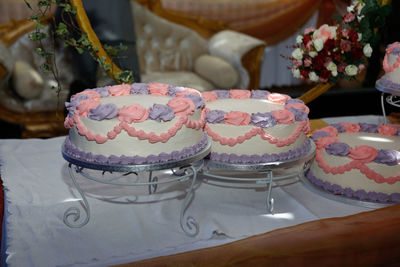 Close-up of wedding cakes on table