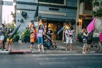 People on street in city