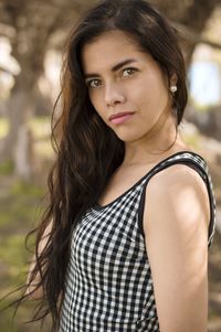 Portrait of young woman looking away